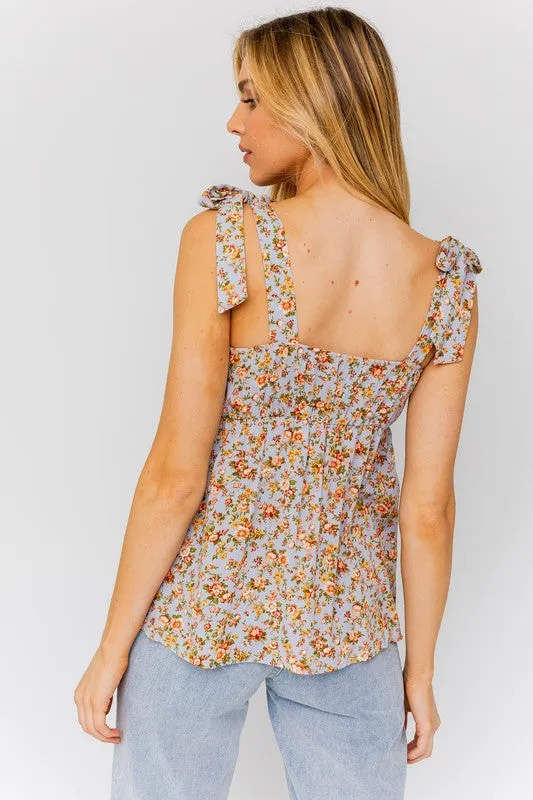 FLORAL SLEEVELESS RUFFLE BOTTOM TOP